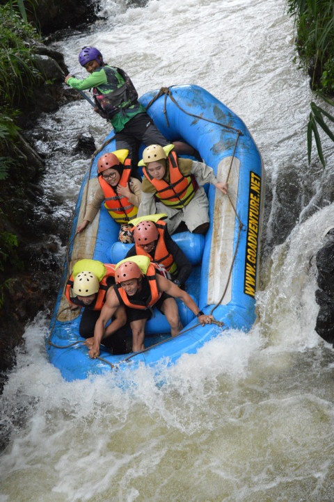 The excitement of white water rafting while on holiday with friends