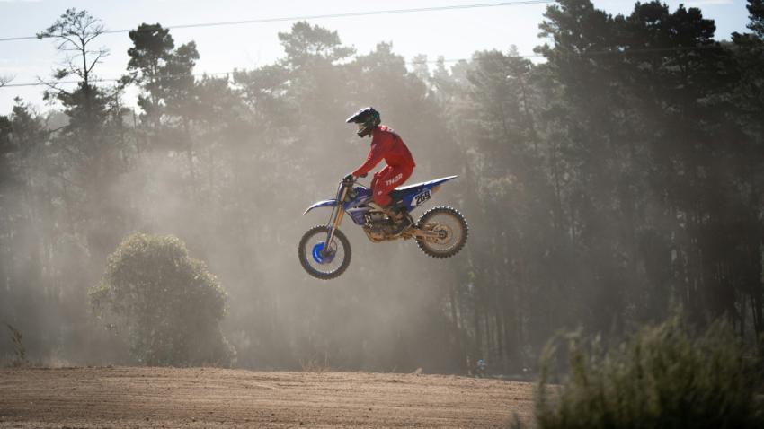 person on a dirt bike in the air