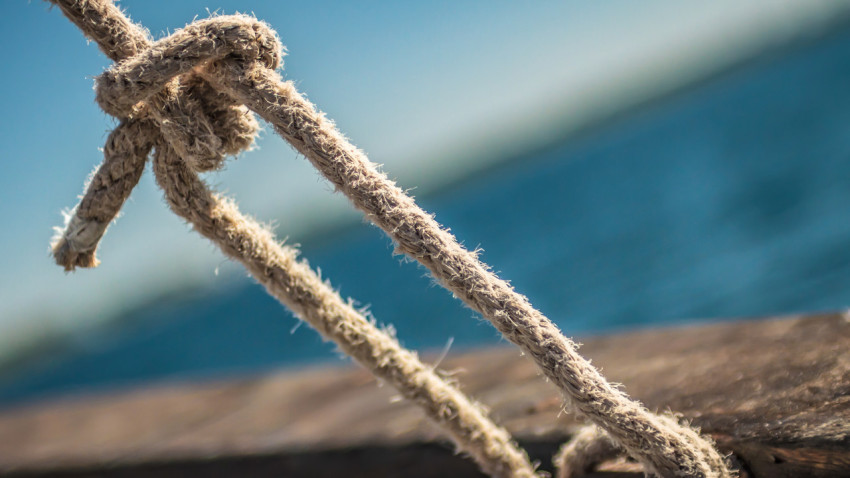 Hanging ropes on cruising yacht