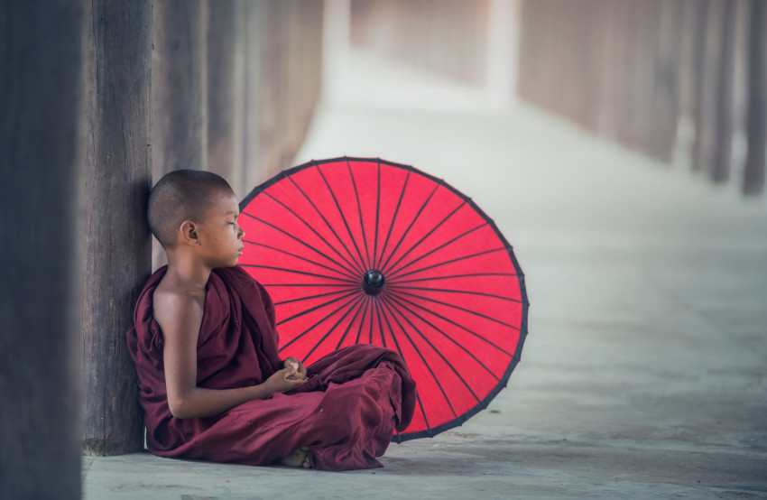 Monk with an umbrella