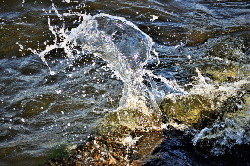 Waves crash on rocks