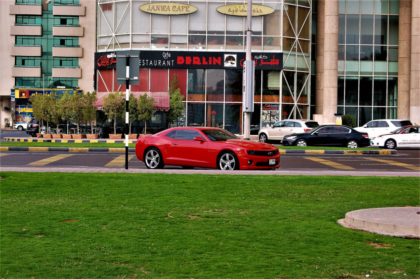 Cityscape with red car