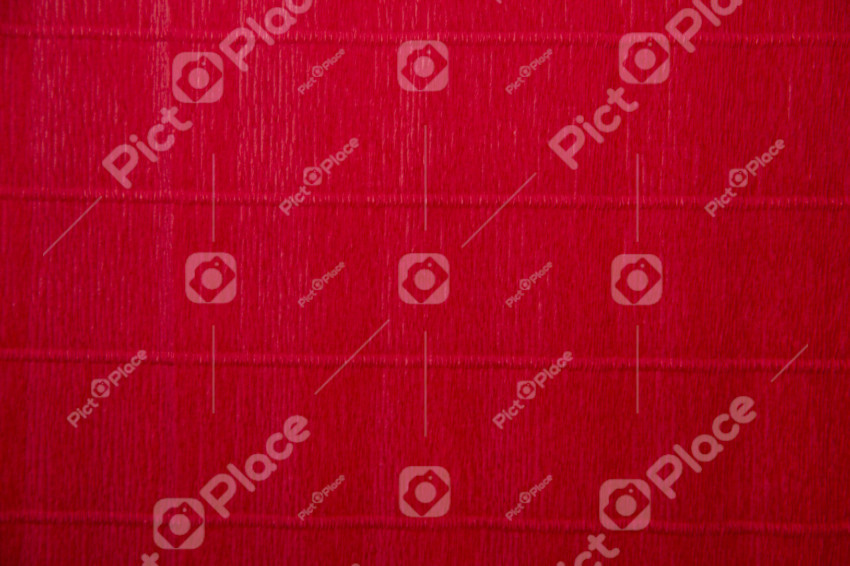Close-up of bright red corrugated paper texture
