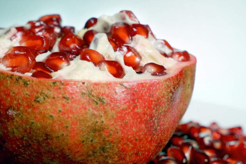 Half peeled pomegranate, closeup