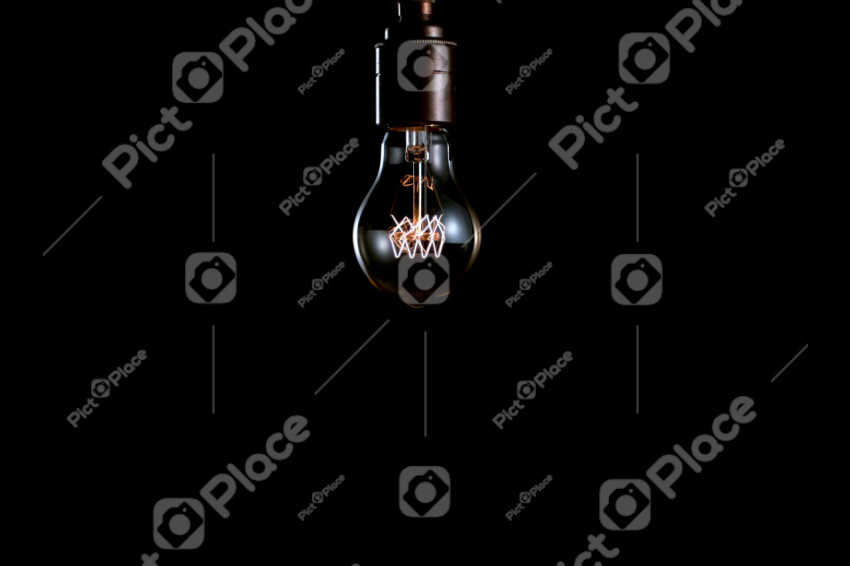 Luminous lamp in a cartridge on a black background.jpg