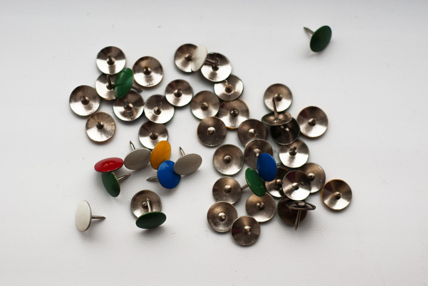 Push pins on the table