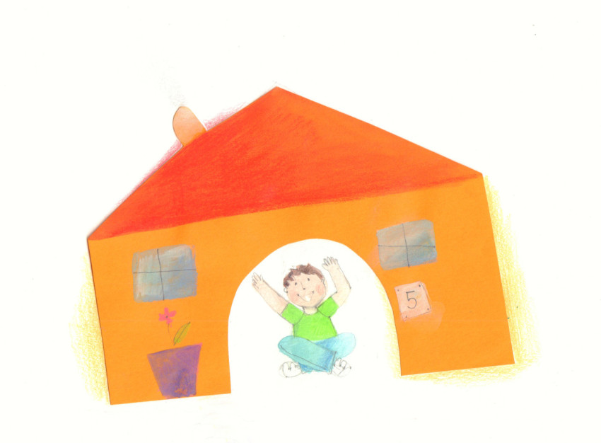 boy in an orange toy house
