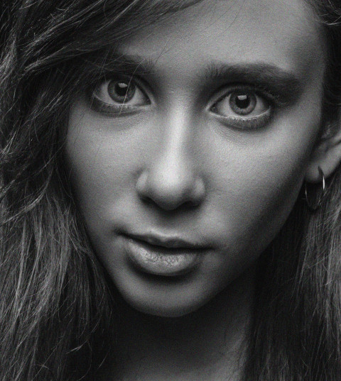 Beautiful girl close-up, black and white photo