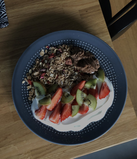 something tasty. Fruit plate of oatmeal and fruits