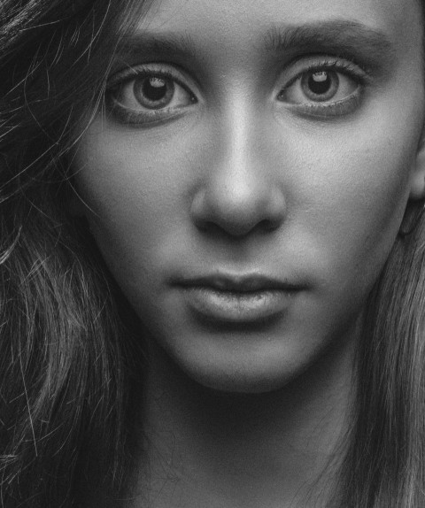 Beautiful girl close-up, black and white photo