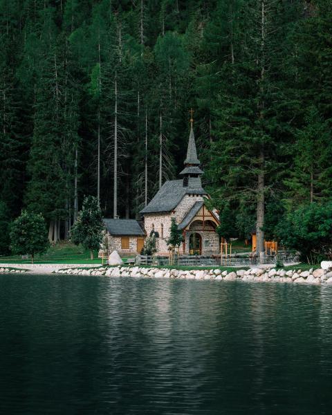 A small church by a lake