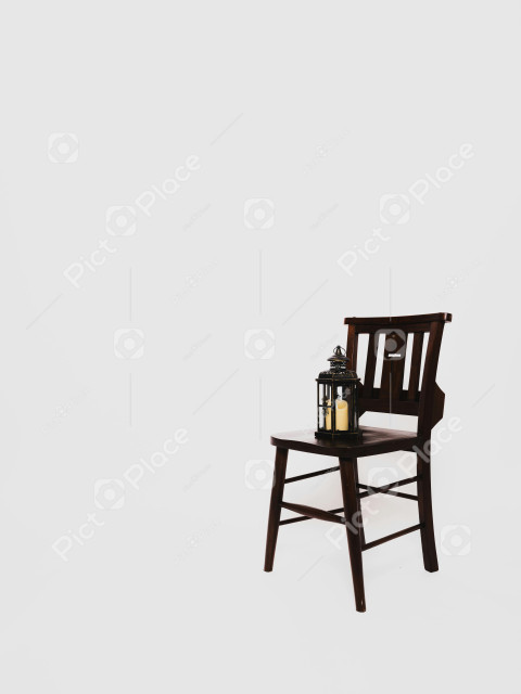 wooden chair with a candle on top