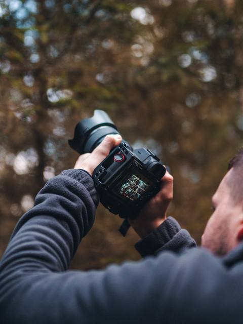 photographer with camera