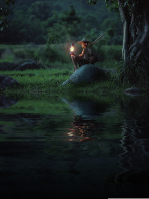 Child with a lantern