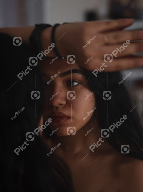 woman in front of a mirror