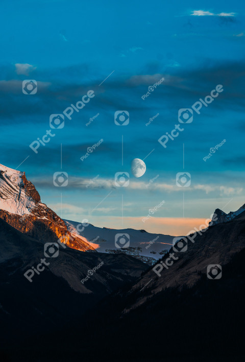 Mountain with a moon in the sky