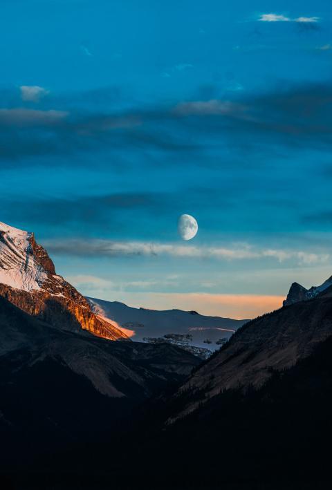 Mountain with a moon in the sky