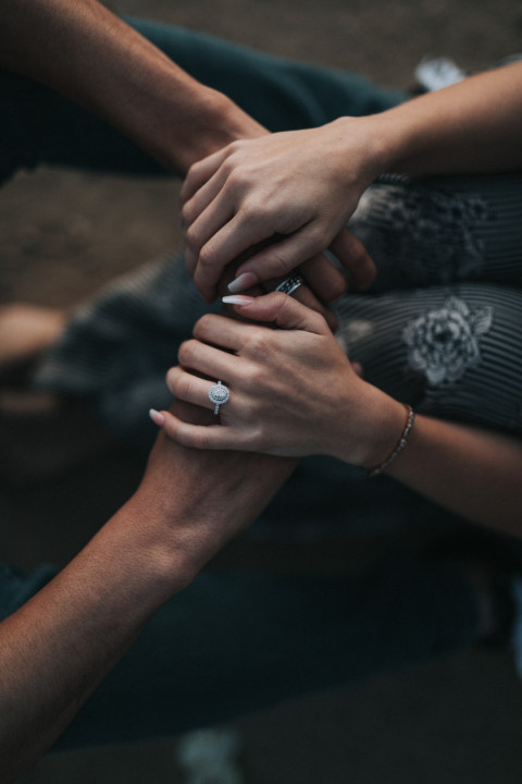 Man and woman hold hands