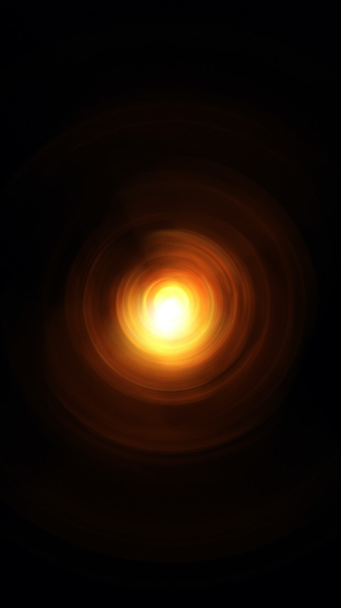 Bright sun, lamp. Glowing disk. Glow of the galaxy