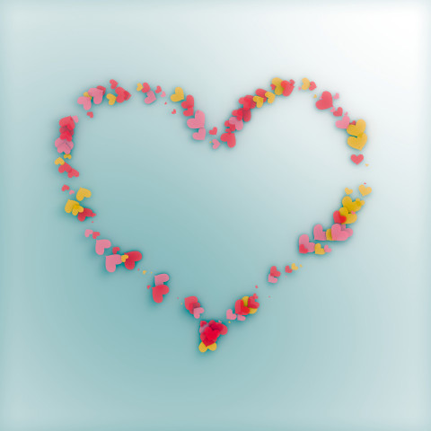 A pink heart made of small hearts along the contour of a large one on a light background. Illustration