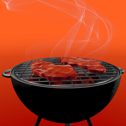 Grill on a pink background with two juicy steaks